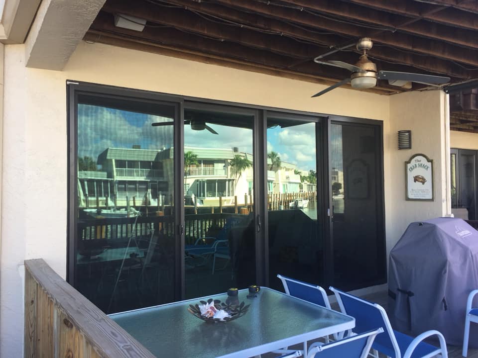 Sliding glass hurricane door