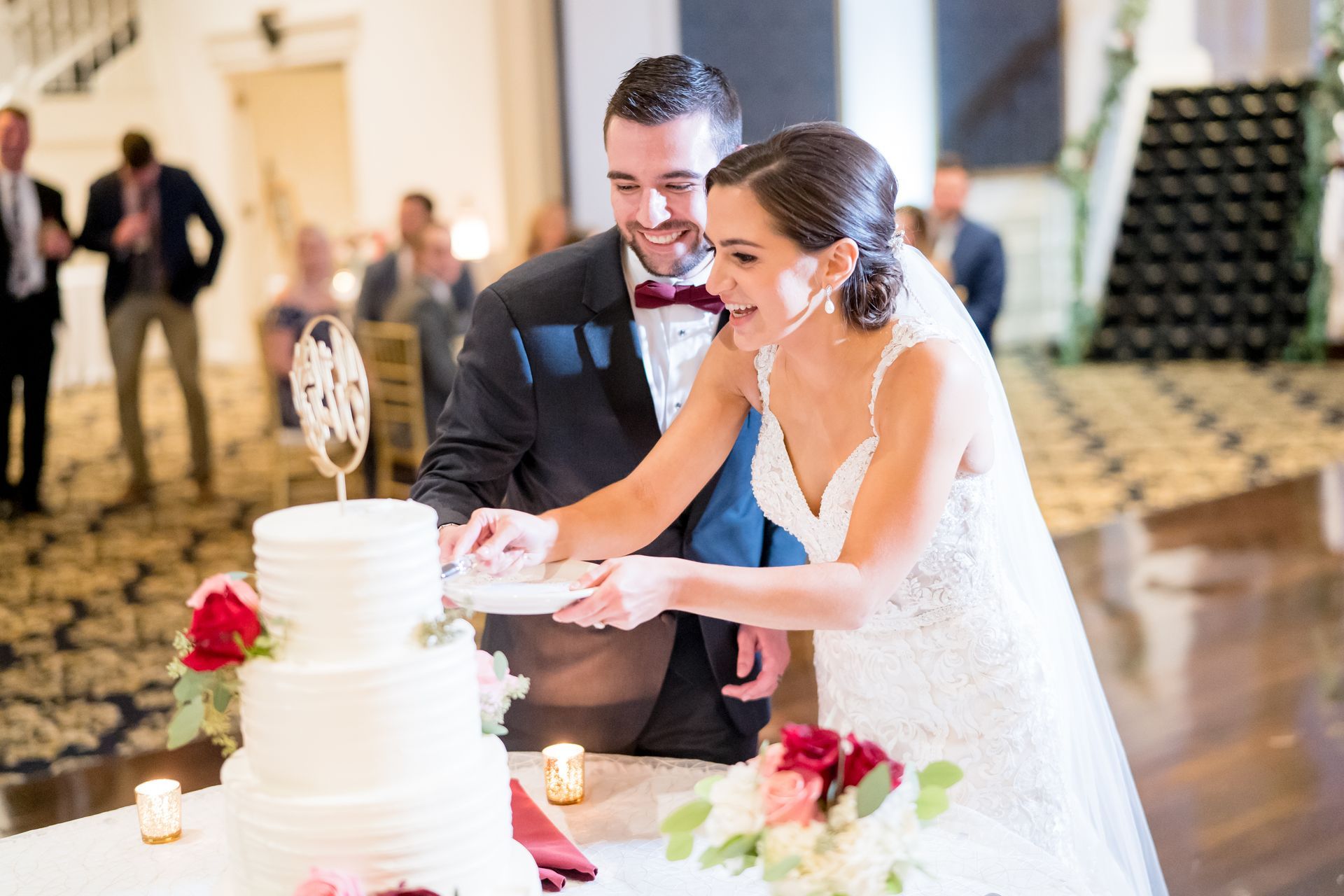 Couple cutting cake