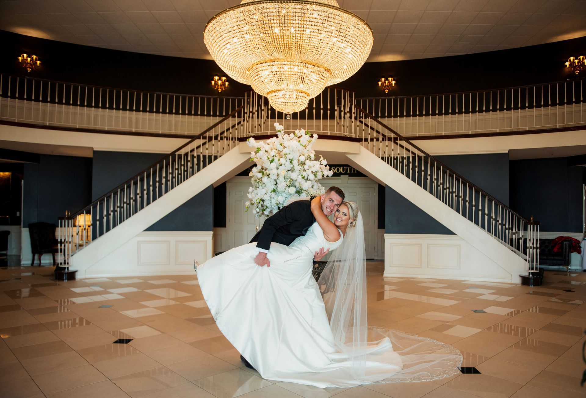 Bride and Groom with chandelier 