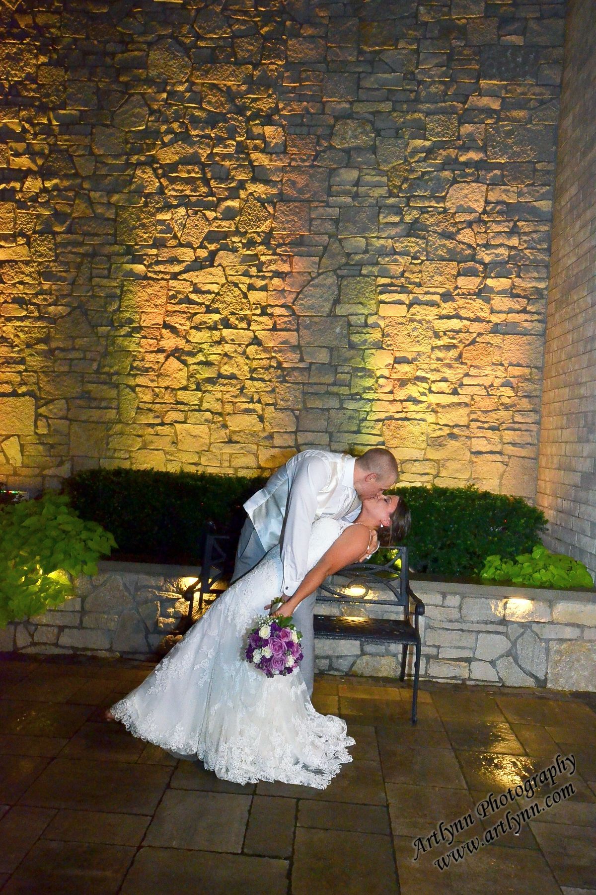Bride and groom in courtyard