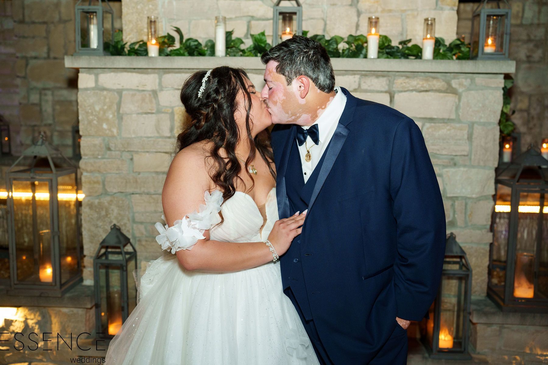 Bride and Groom Kissing in Courtyard