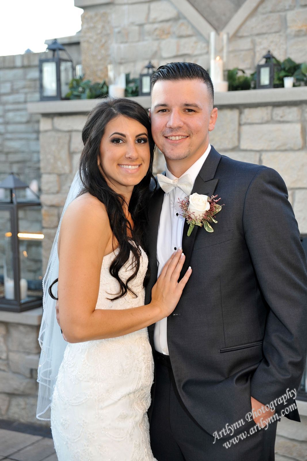 Bride and groom in courtyard