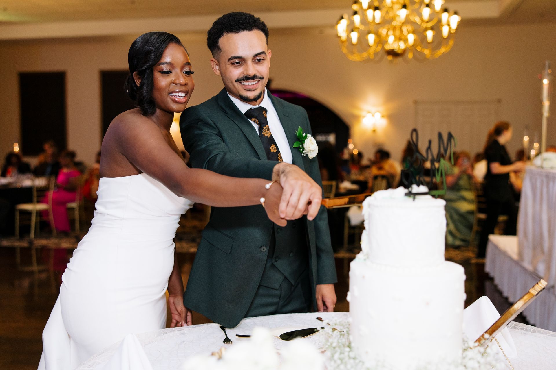 Bride and Groom cutting cake