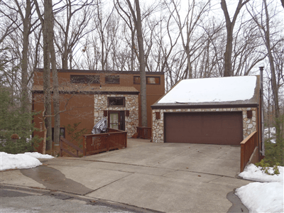 Brown residential home with new windows in State College, PA