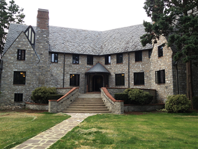 Grey stone home renovated with new windows in State College, PA