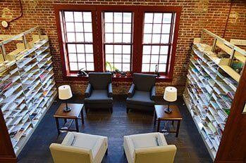 Tables And Lantern Inside The Library — Commercial Builders in State College, PA