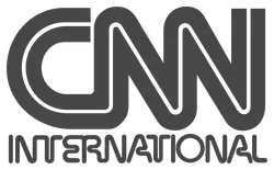 Logo of CNN International, representing a global news client for whom we provide reliable ground transportation and assistance for critical reporting.