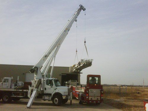 White Boom Truck Lifting Object — Kansas City, MO — Prestige Crane Service