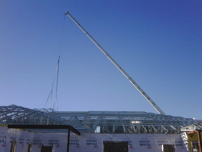 Lifting a Metal Frame — Kansas City, MO — Prestige Crane Service