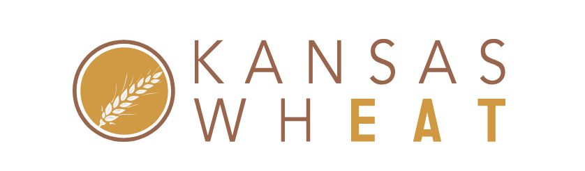 A logo for kansas wheat with a wheat ear in a circle