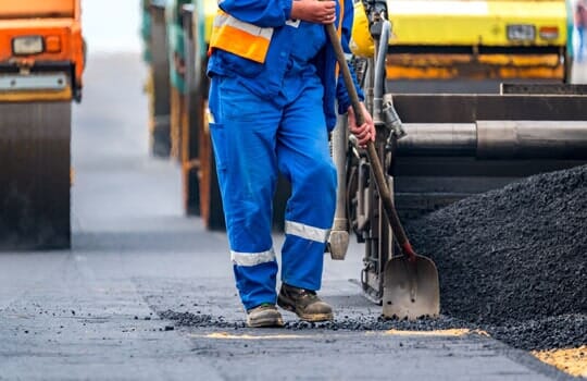 Workers and the asphalting machines — Asphalt and Concrete Services in Denver, CO