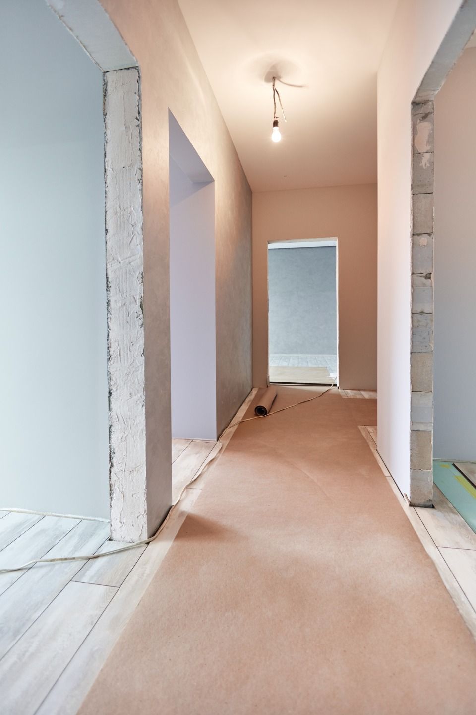 a new apartment repair finishing works in progress, plastering, painting and flooring construction