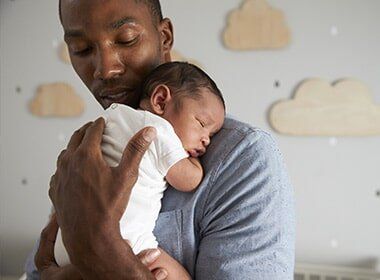 Child Custody — Father Holding Newborn Baby in Goldsboro, NC