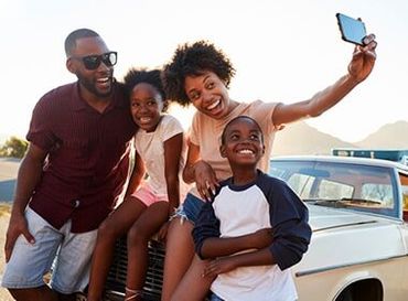 Family Law Attorney — Family Taking Selfie in Goldsboro, NC