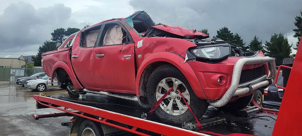 Crashed Red SUV On A Tow Truck - All Recovery Towing & Transport in Richardson ACT