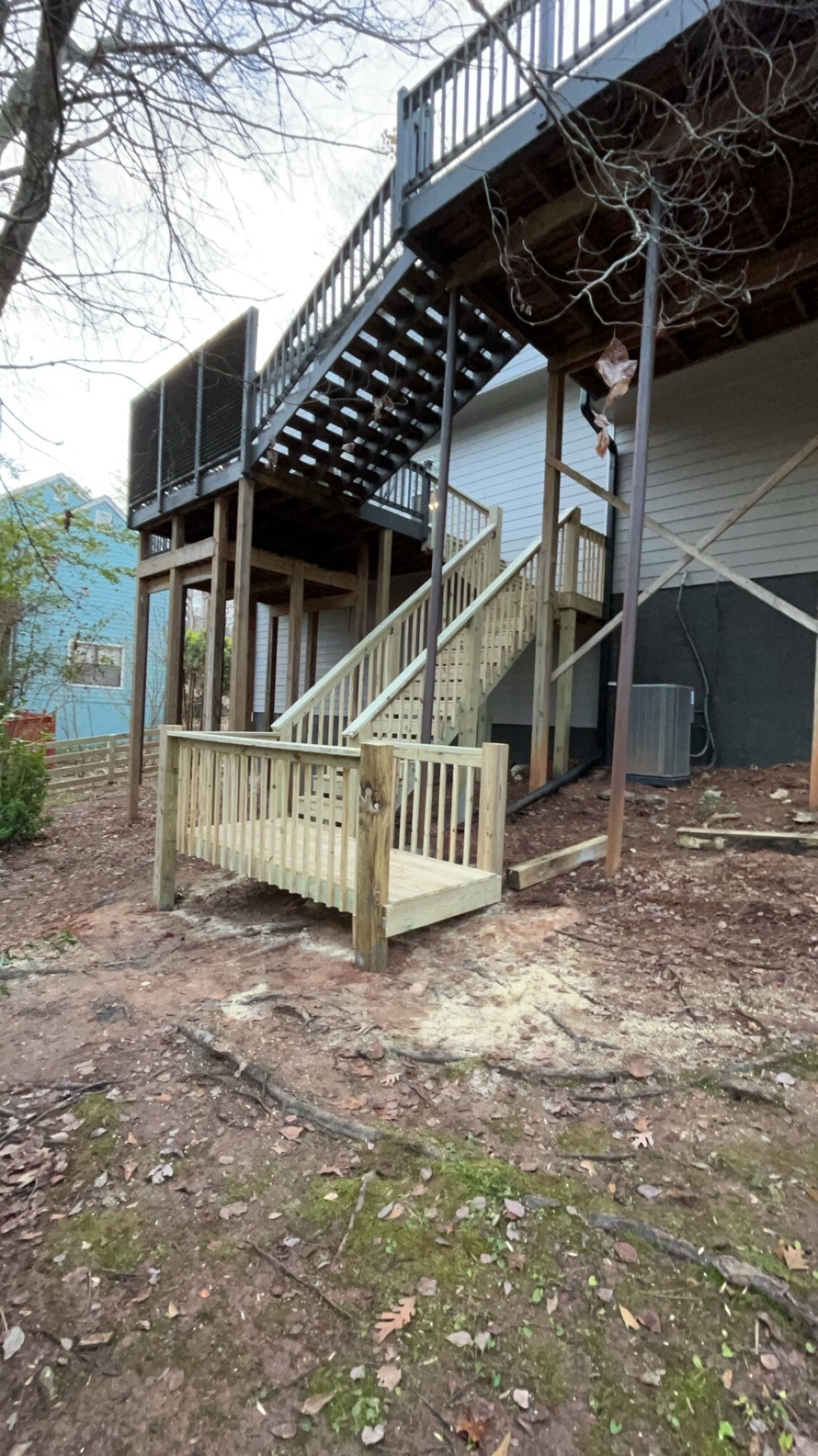 custom deck and staircase in back of a home in North Georgia