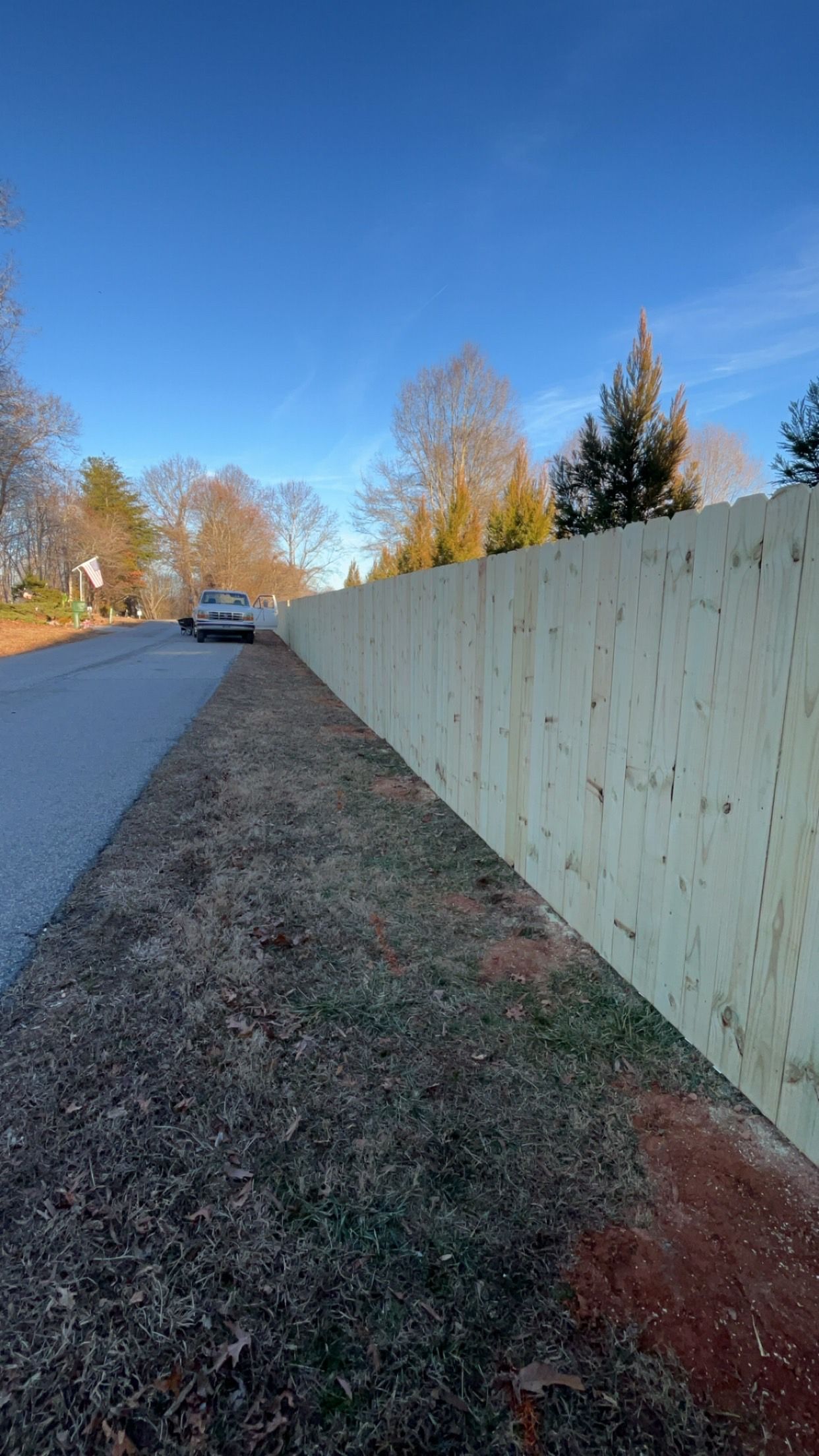 privacy fence along a road