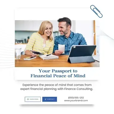 A man and a woman are sitting at a table with a laptop.