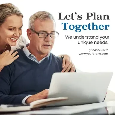 A man and a woman are looking at a laptop computer.