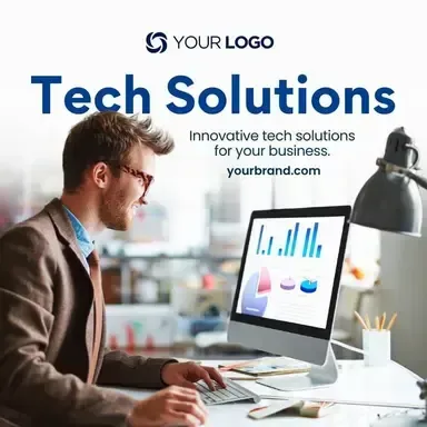 A man is sitting at a desk using a computer.