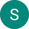 The letter s is in a green circle on a white background.