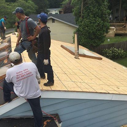 contractors working on a roof
