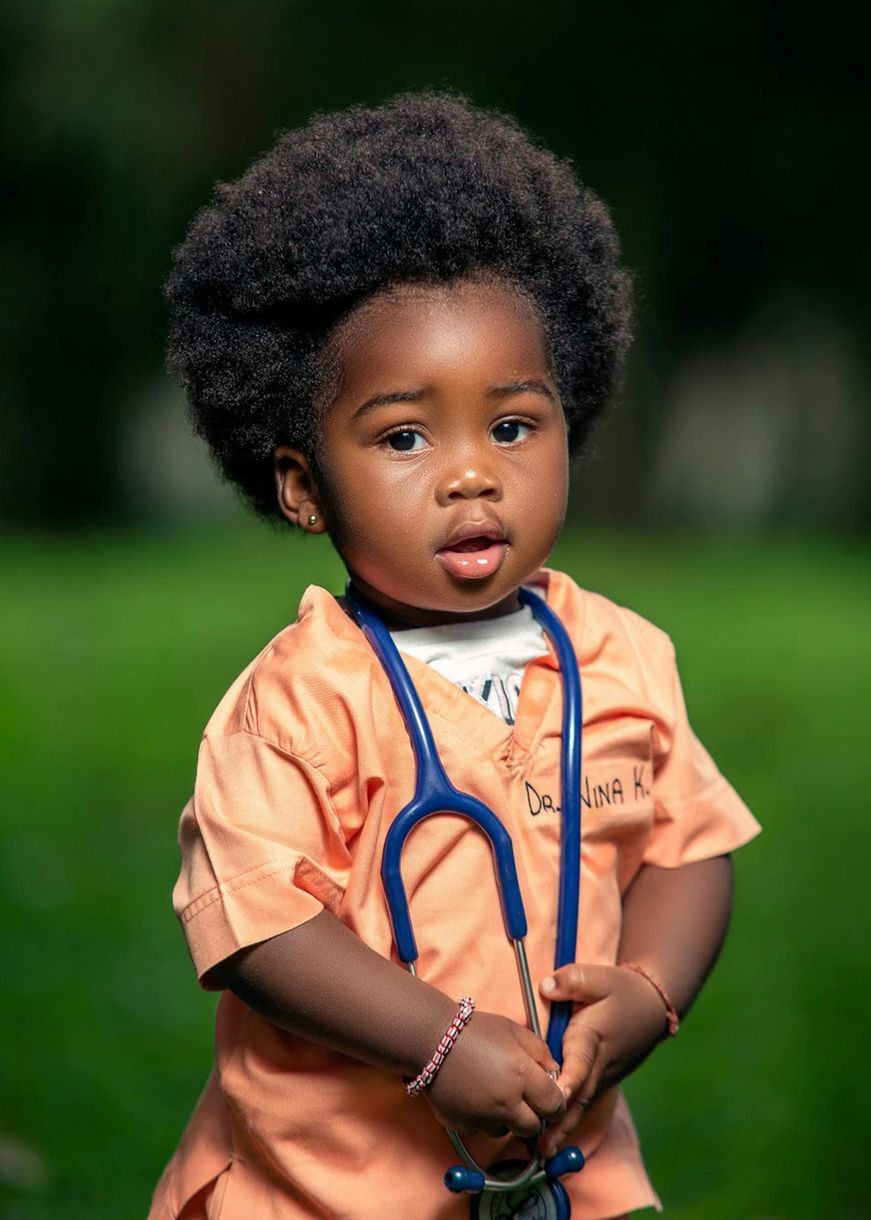 Doctor listening to baby's heart with a stethoscope