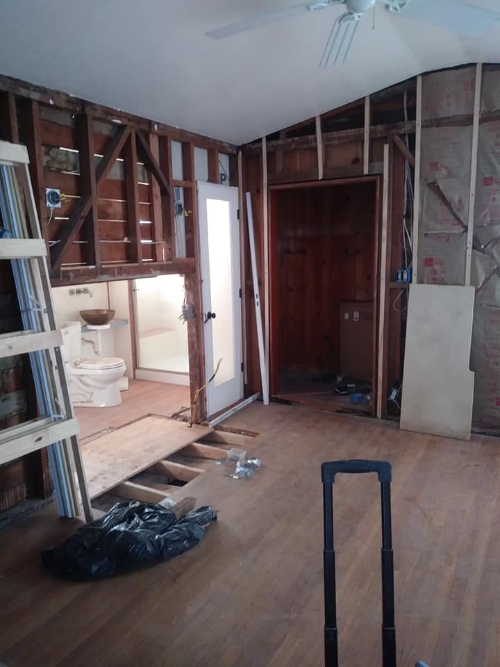 A living room renovation with bathroom