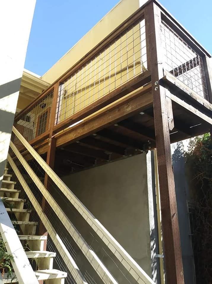 Custom Railings and Stair Installed Outside the Deck