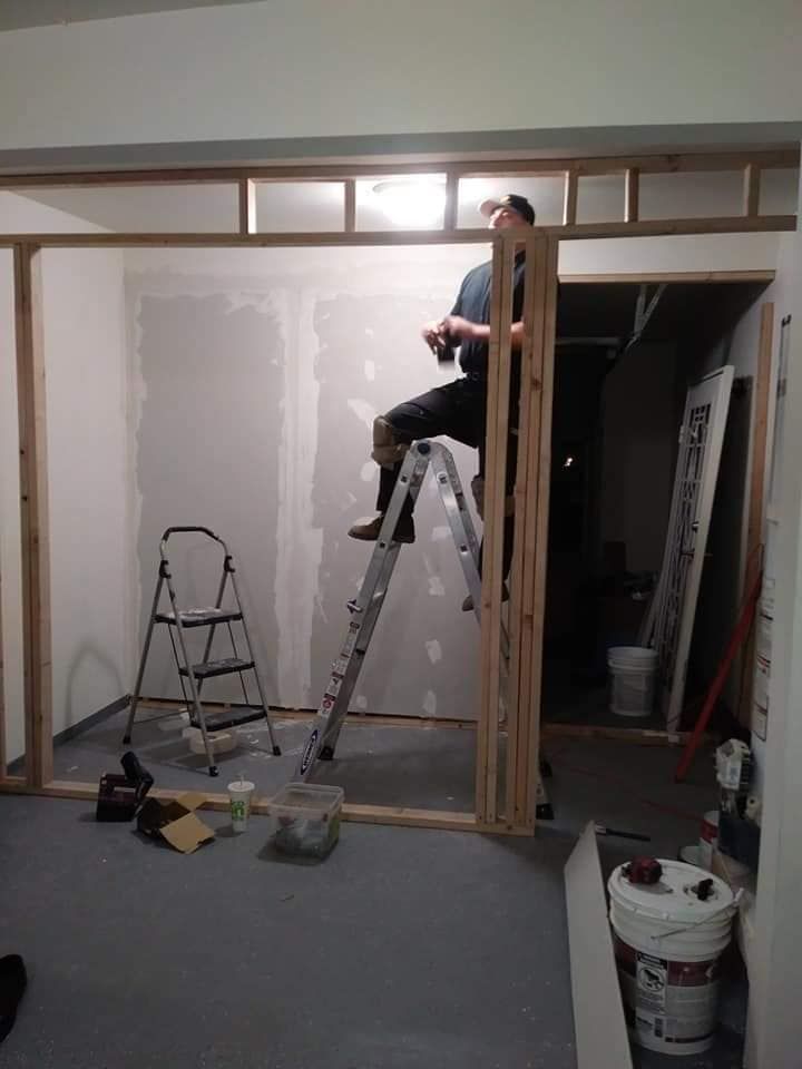 A man repairing the outlet and lighting