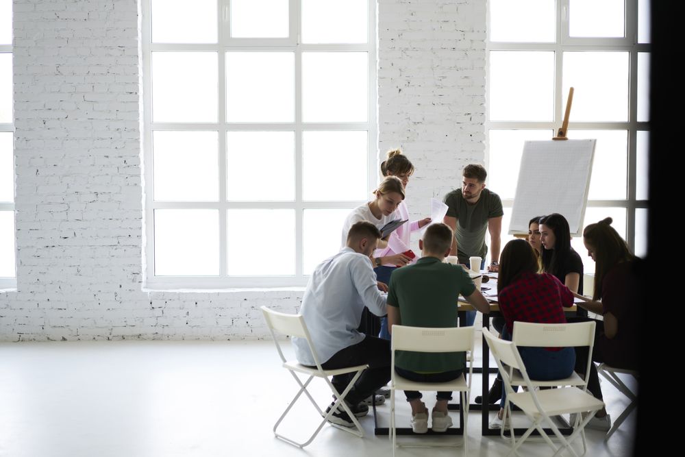 A Woman Is Doing A Pole Dance On A Black Background — NCA Consulting Pty Ltd in Alstonville, NSW