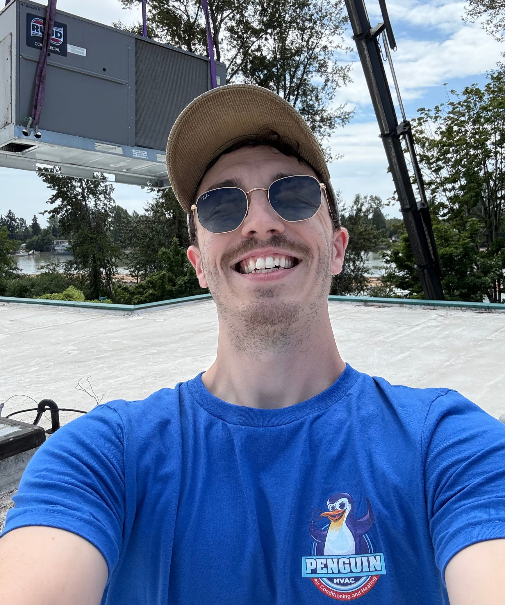 Penguin HVAC installer installing new RTU in Vancouver