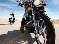 Motorcycle Insurance — Men Riding Motorcycle in Waverly, OH