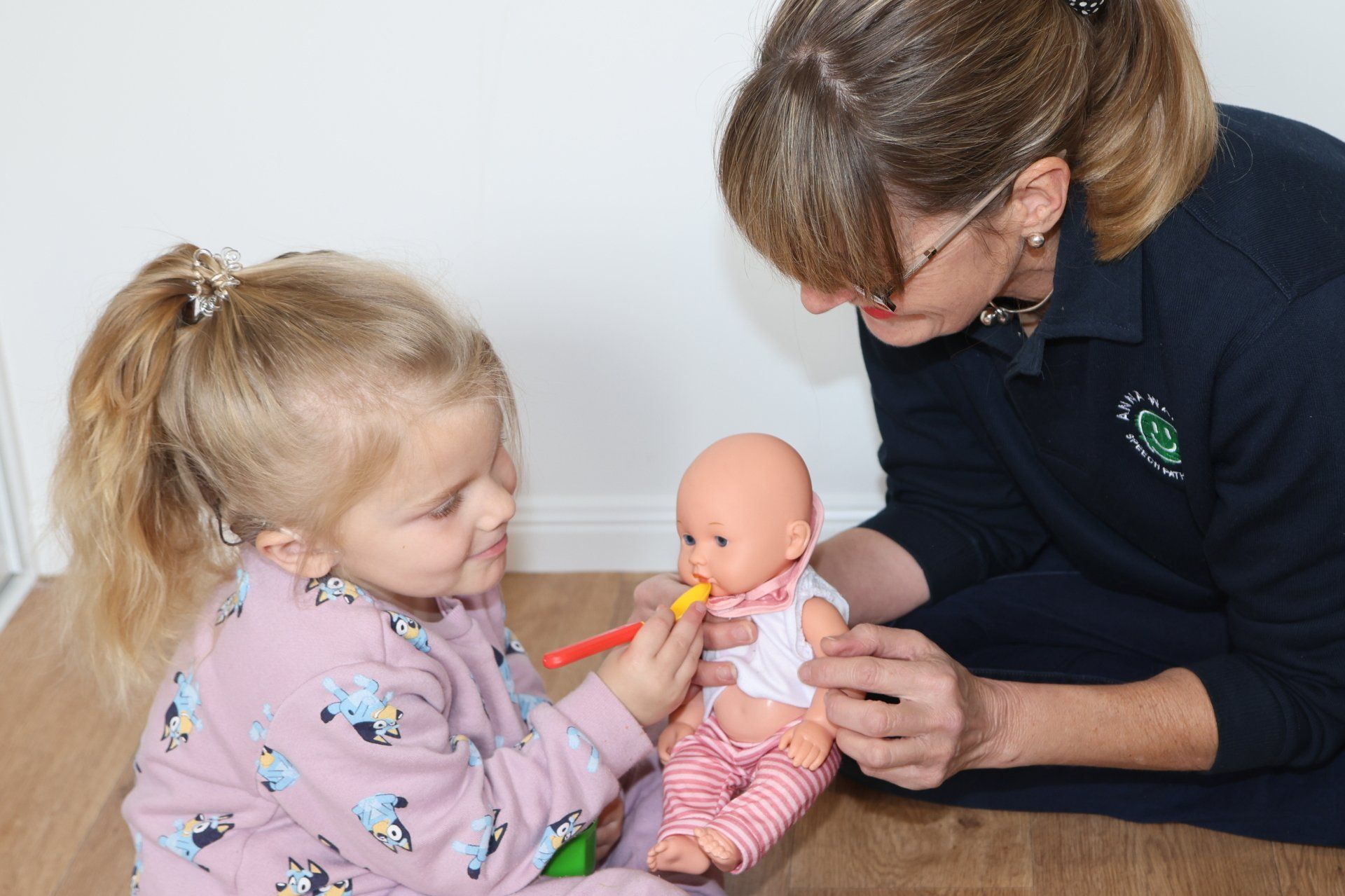 Therapist And Kid In Clinic — Speech Pathologist in Toowoomba, QLD