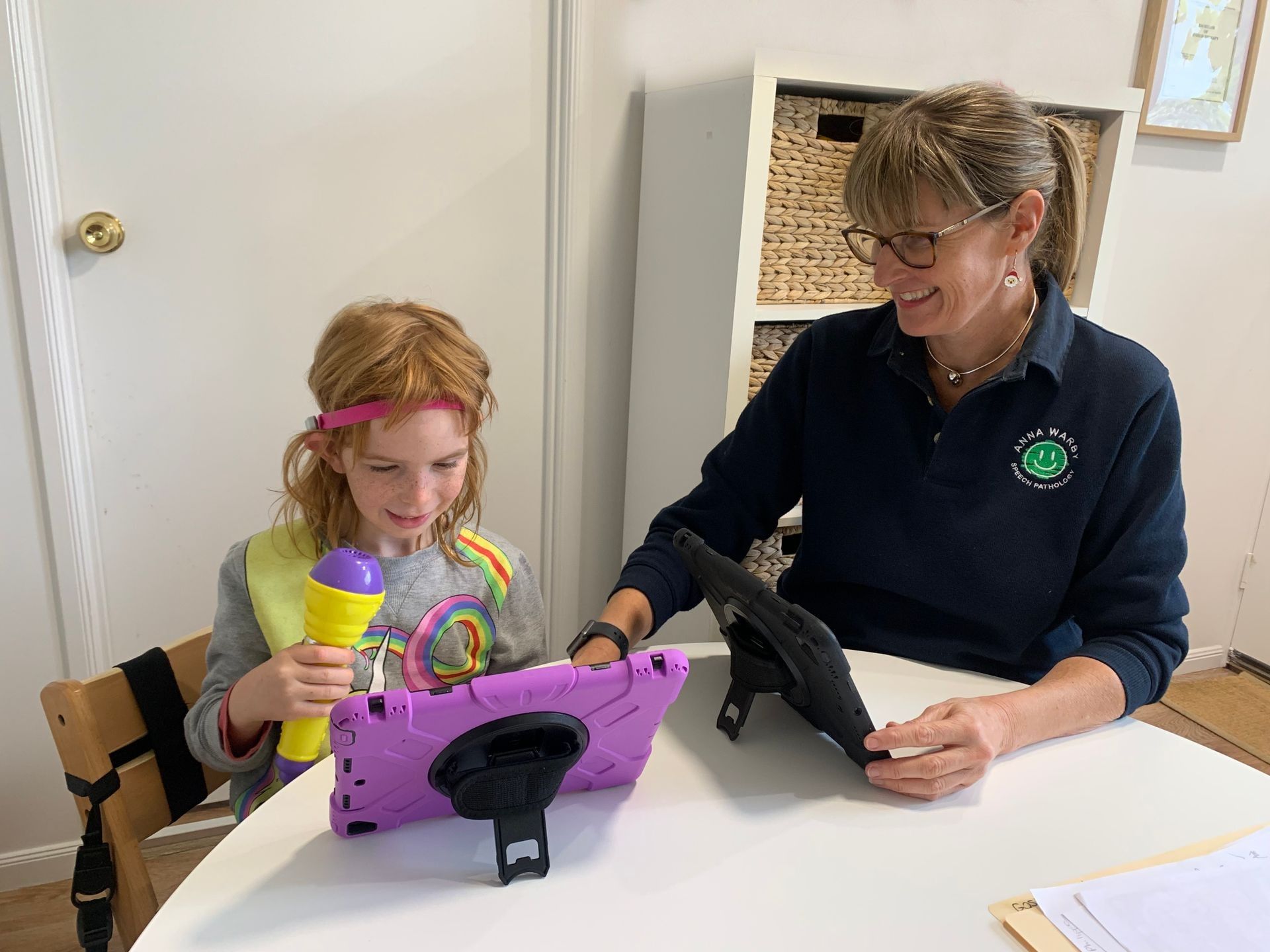 Boy Playing with a Dog — Speech Pathologist in Toowoomba, QLD