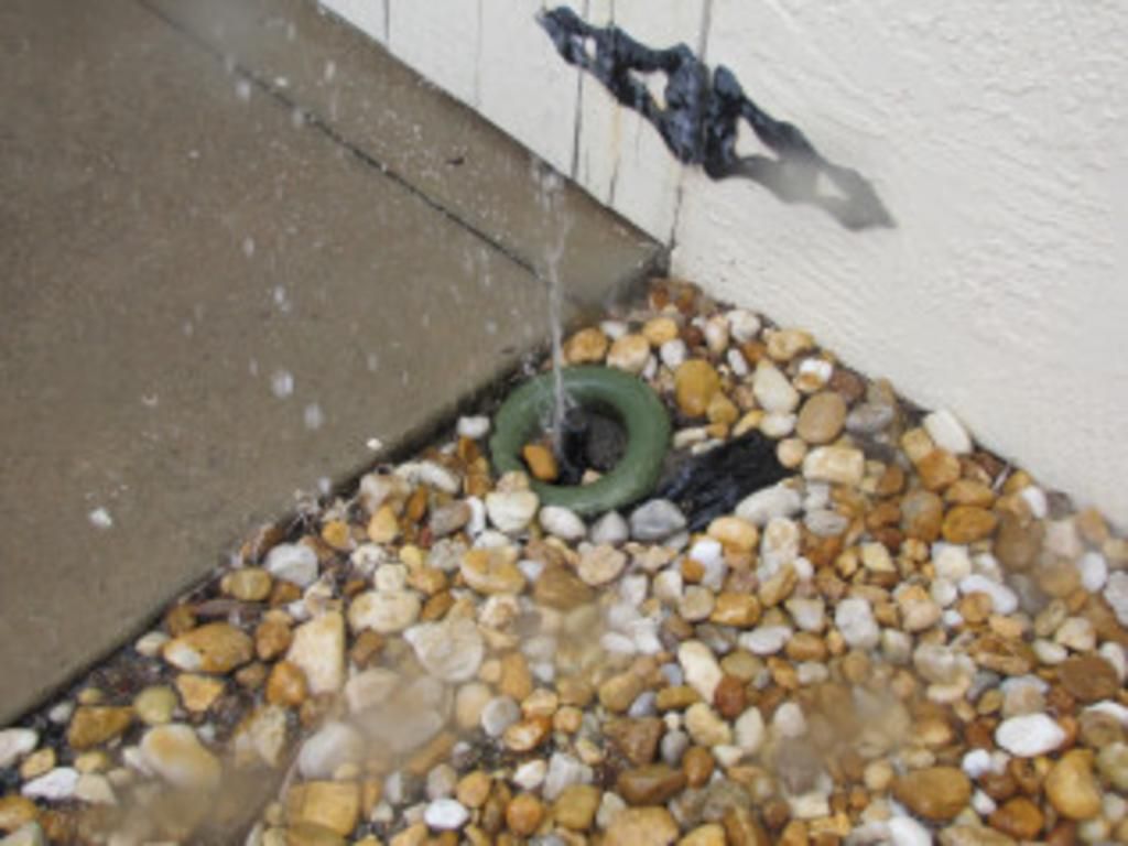 Water is coming out of a hole in the ground