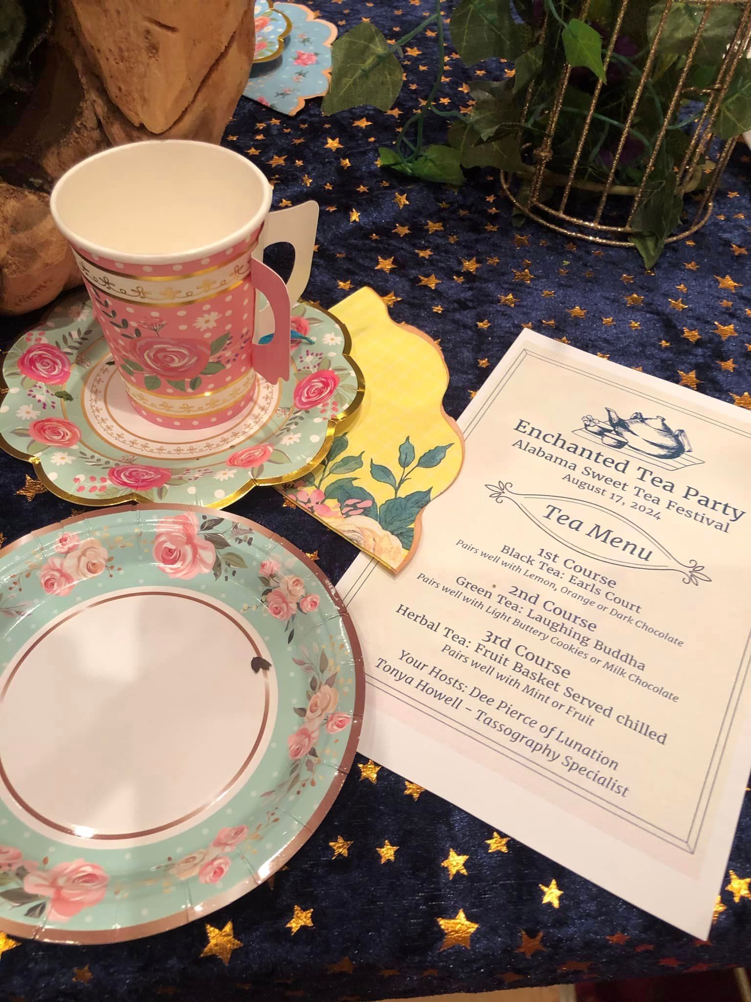 A cup and saucer are on a table next to a menu.