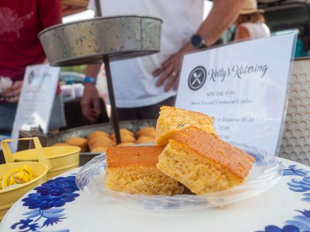 A plate of cornbread on a table from Kellys Katering