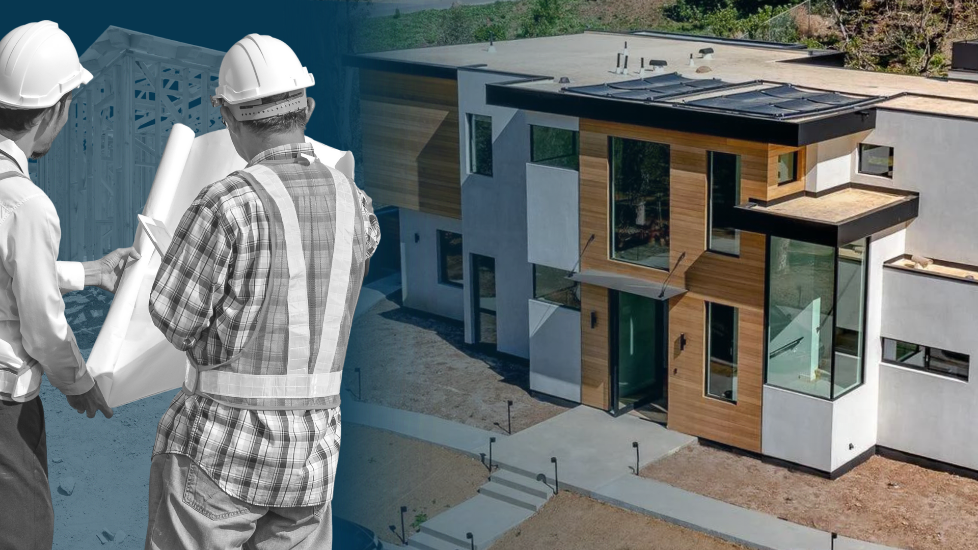 Two men in hard hats are looking at a blueprint of a house