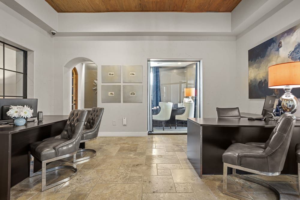 Leasing office with a lot of desks and chairs at Marquis at the Reserve in Katy, TX.