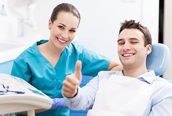 Patient giving thumps up after dental care - Preventive care in Chesnee, SC