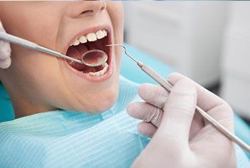 Patient getting teeth checked - Exams and cleaning in Chesnee, SC