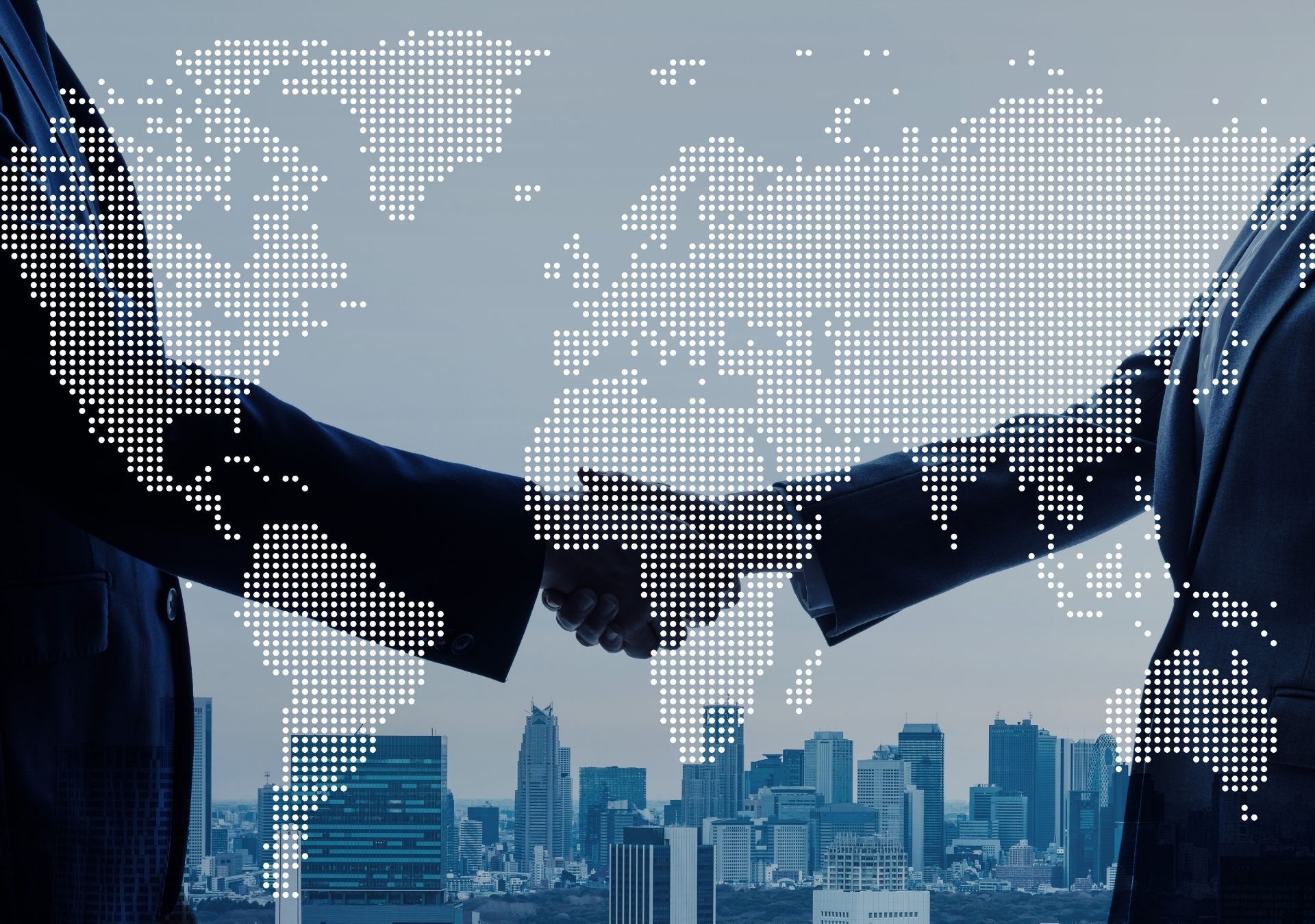 Two business people shaking hands in front of a world map and city skyline.