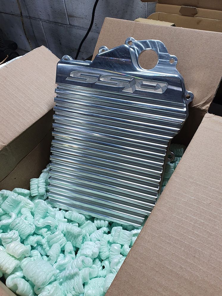 A Metal Object is Sitting in a Cardboard Box — Northern Service Centre in Edmonton, QLD