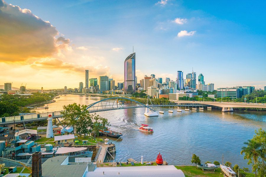 A View of A City with A River in The Foreground and A City Skyline in The Background — Start Learning Automotive in Brisbane, Qld