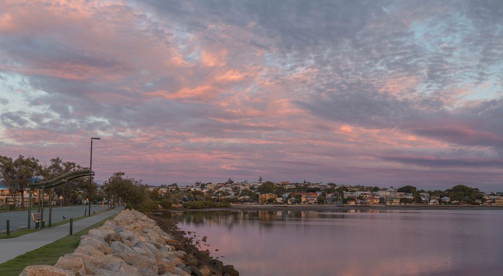 A Large Body of Water with A Sunset in The Background — Start Learning Automotive in Brisbane, QLD