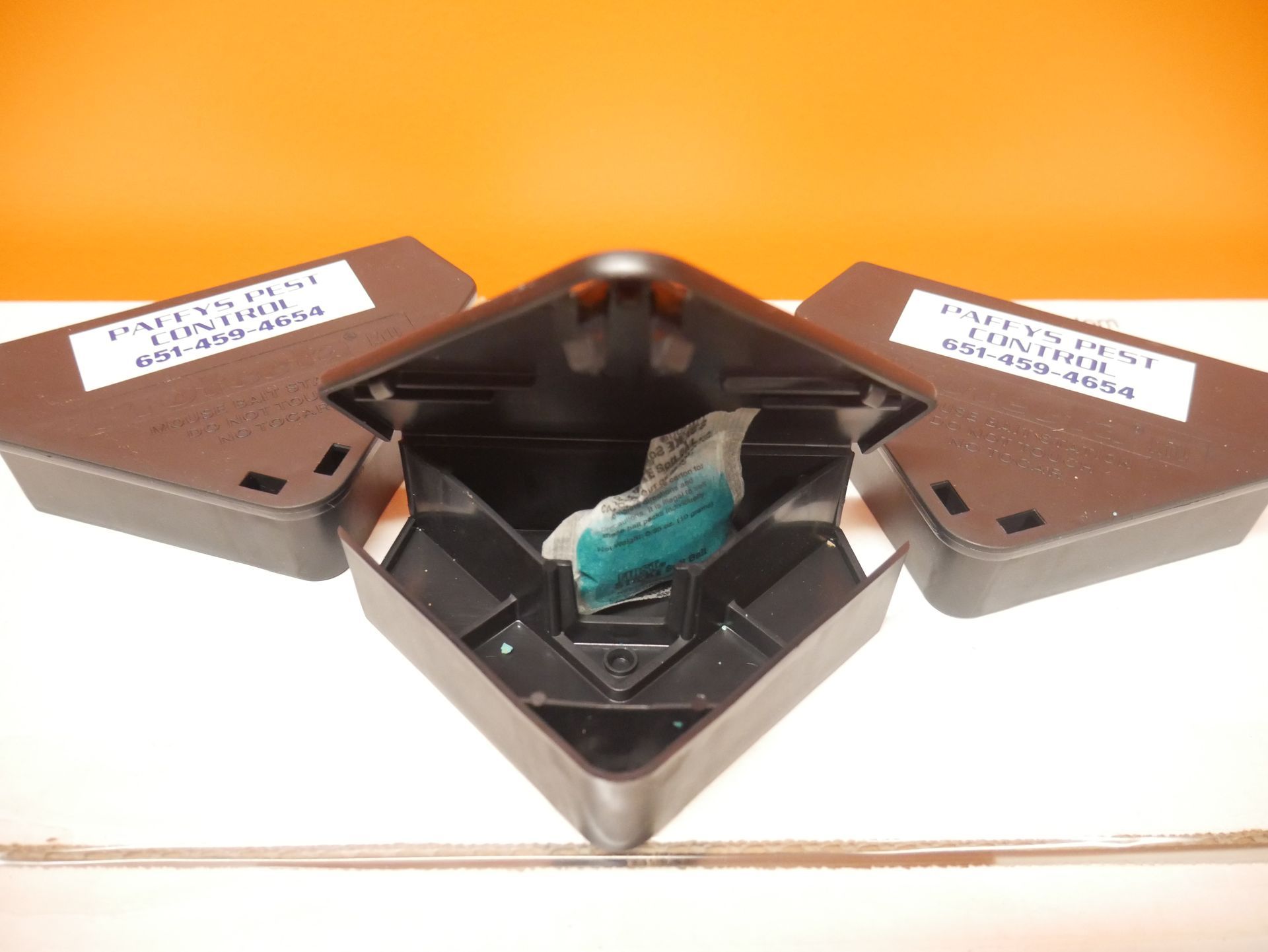 3 Bait Stations, one is open and the other two are closed