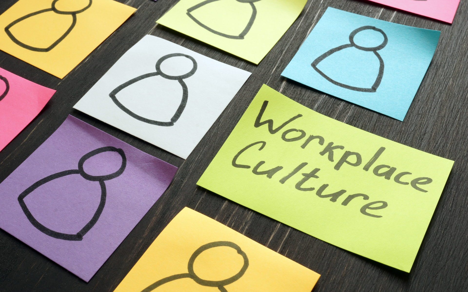 Diverse hiring panel evaluating job candidate in modern office
