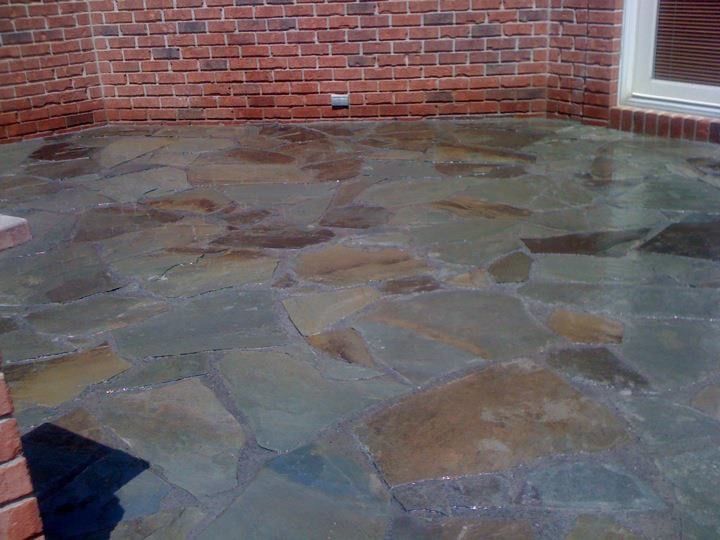 A stone patio stamped with flagstone.