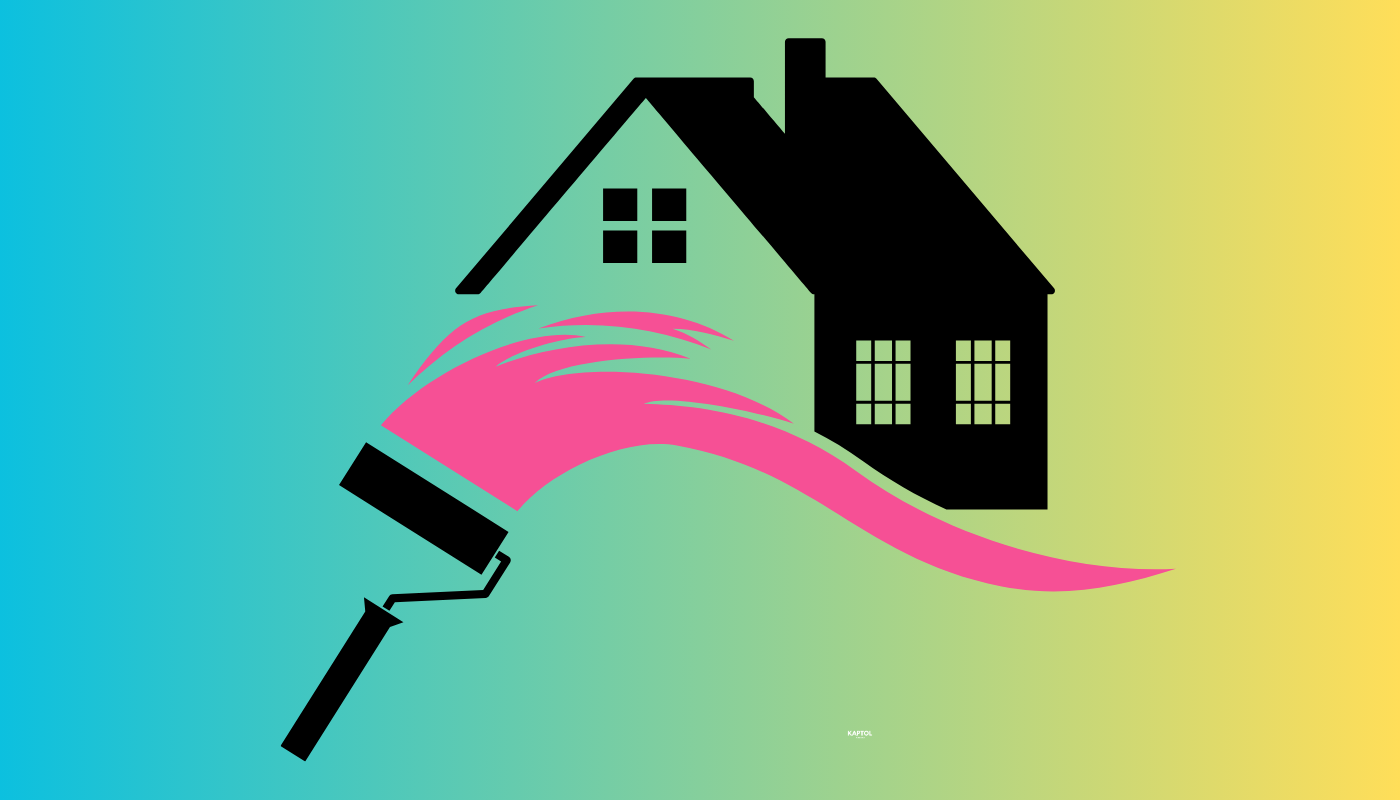 A house is being painted with a pink brush.
